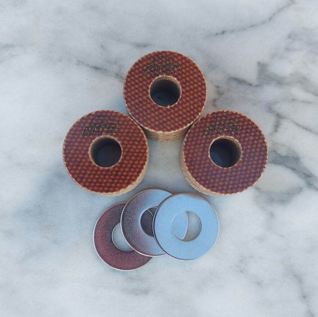 Three Hi-Torque Rollers Speed UTV clutch rollers and three stainless washers.